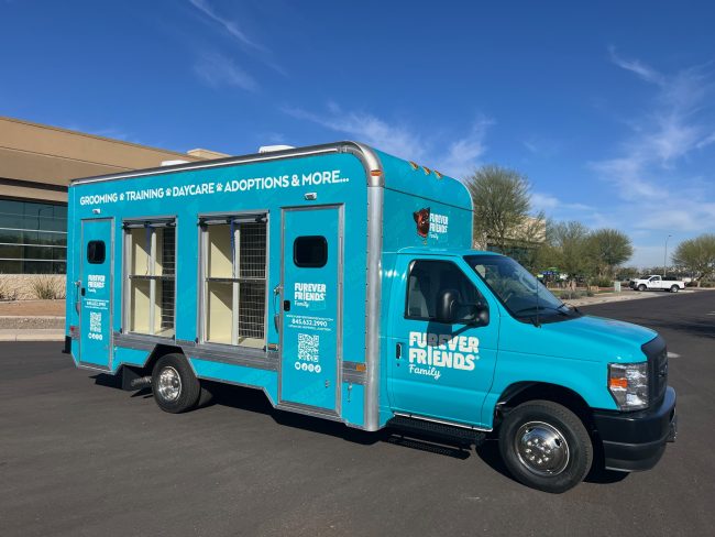 custom 26ft mobile adoption clinic with exterior pet display