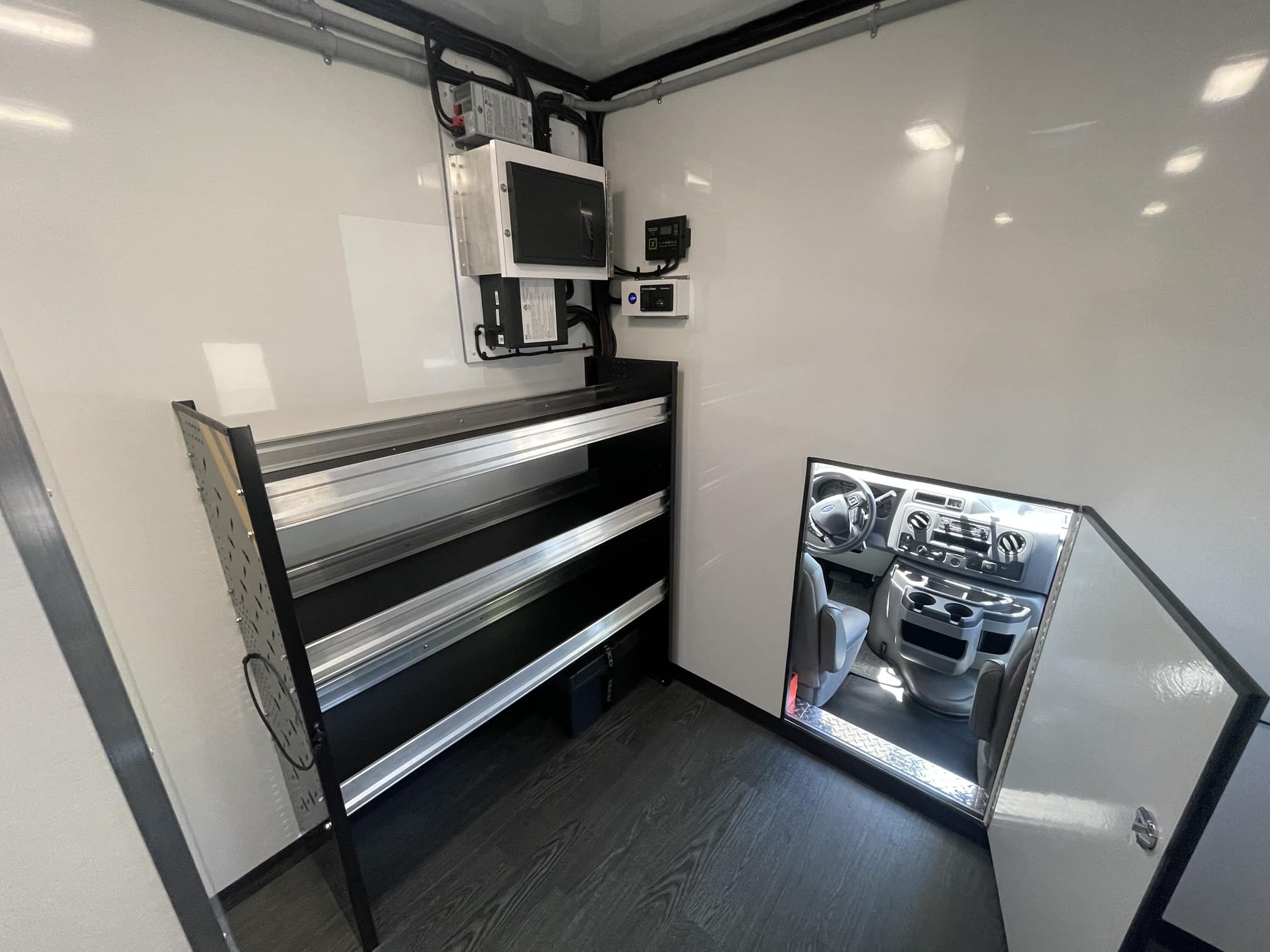Magnum-Mobile-26ft-Mobile-Contractor-Office-Professional-Series-DS-Front-Storage-and-Pass-Thru-to-Cab-7