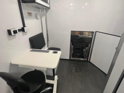 Magnum-Mobile-26ft-Mobile-Treatment-Clinic-Professional-Series-Pass-Thru-Door-Open-8